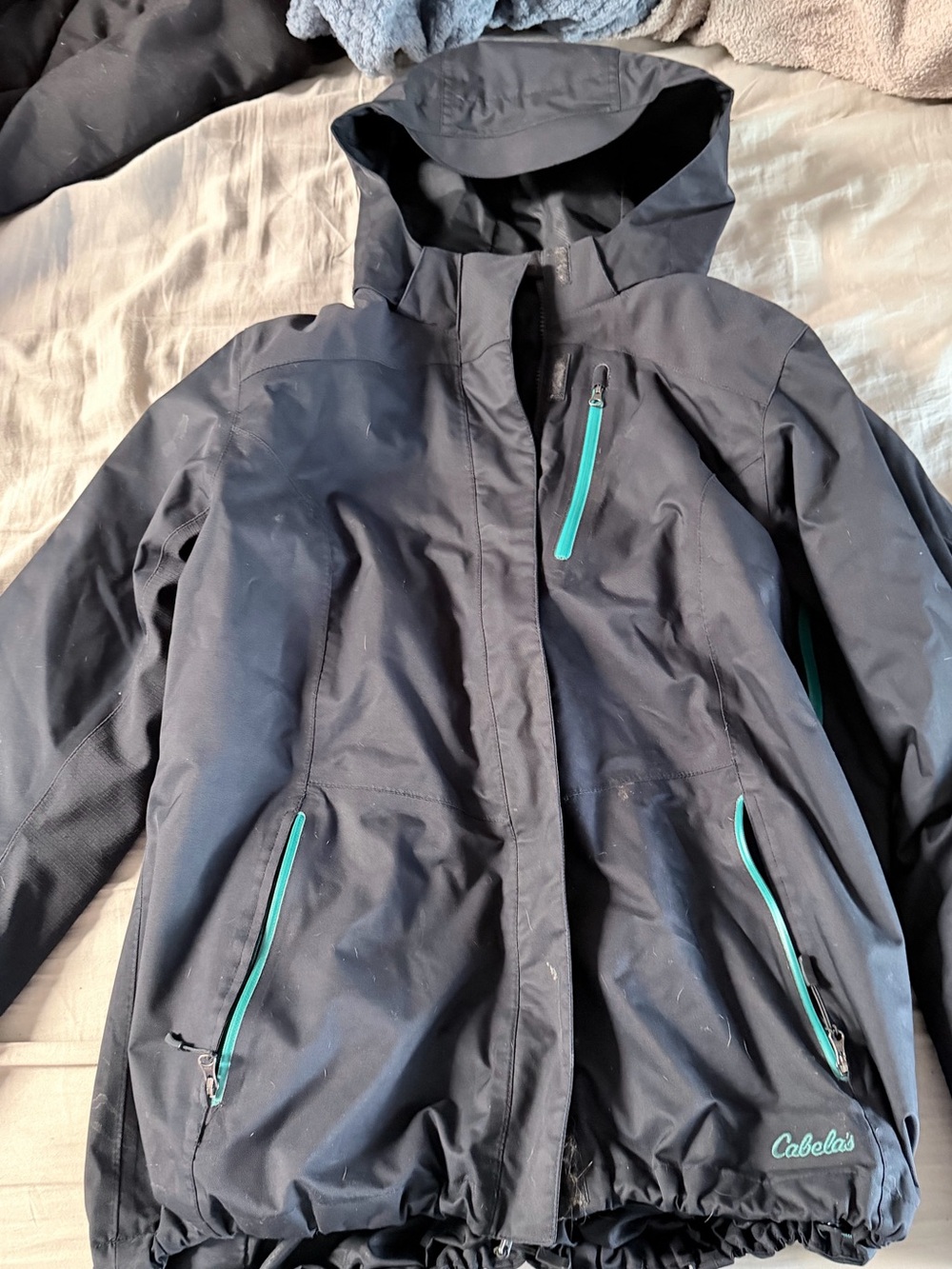 Cabela's Women’s Black Hooded Waterproof 2 in 1 Coat with Teal Accents